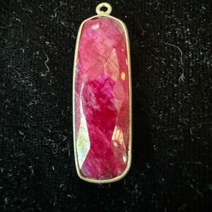 Dyed crystal pendant.